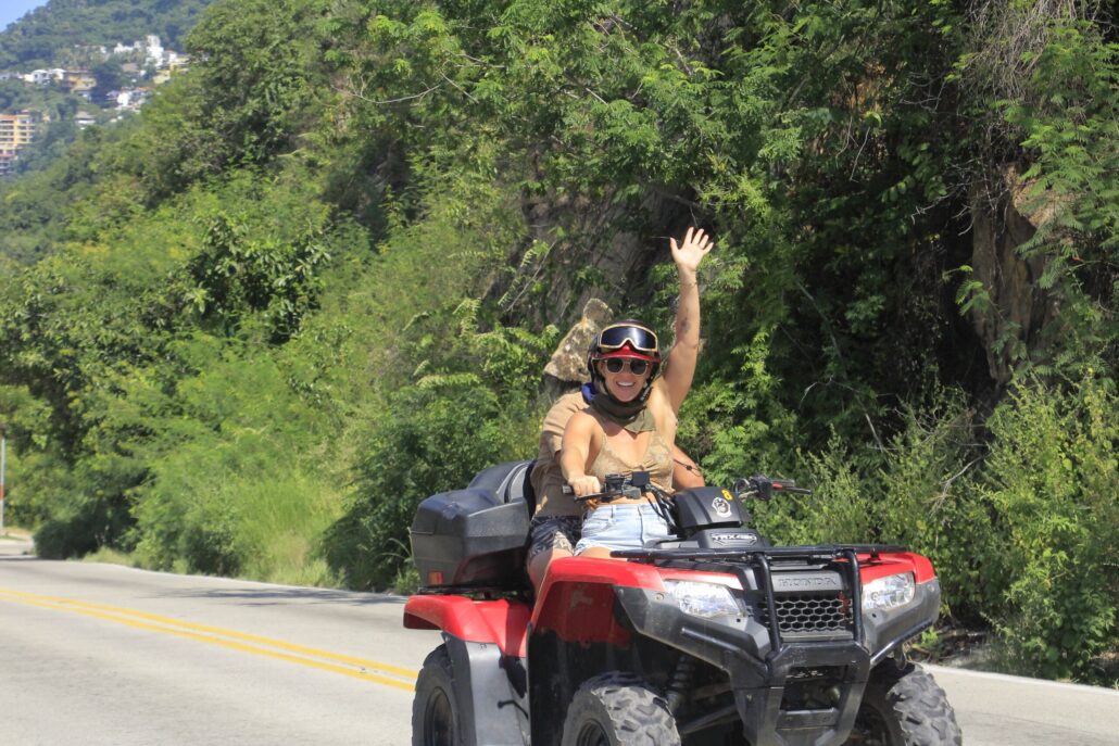dirtymonkeyadventure_dirty-atv-zipline-combo-atv-rider-waving-green-hills Dirtymonkeyadventure Dirty Atv Zipline Combo Atv Rider Waving Green Hills