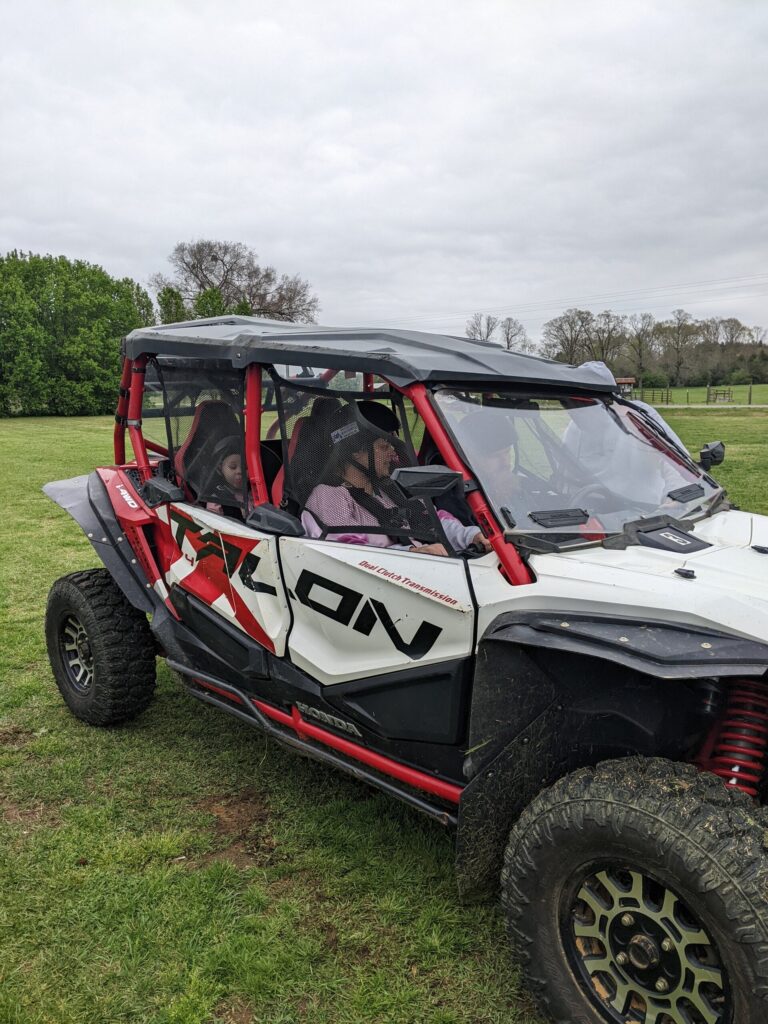 Uwharrieatvrentals Honda Talon  Seater Honda Talon  Seater Parked Green Field