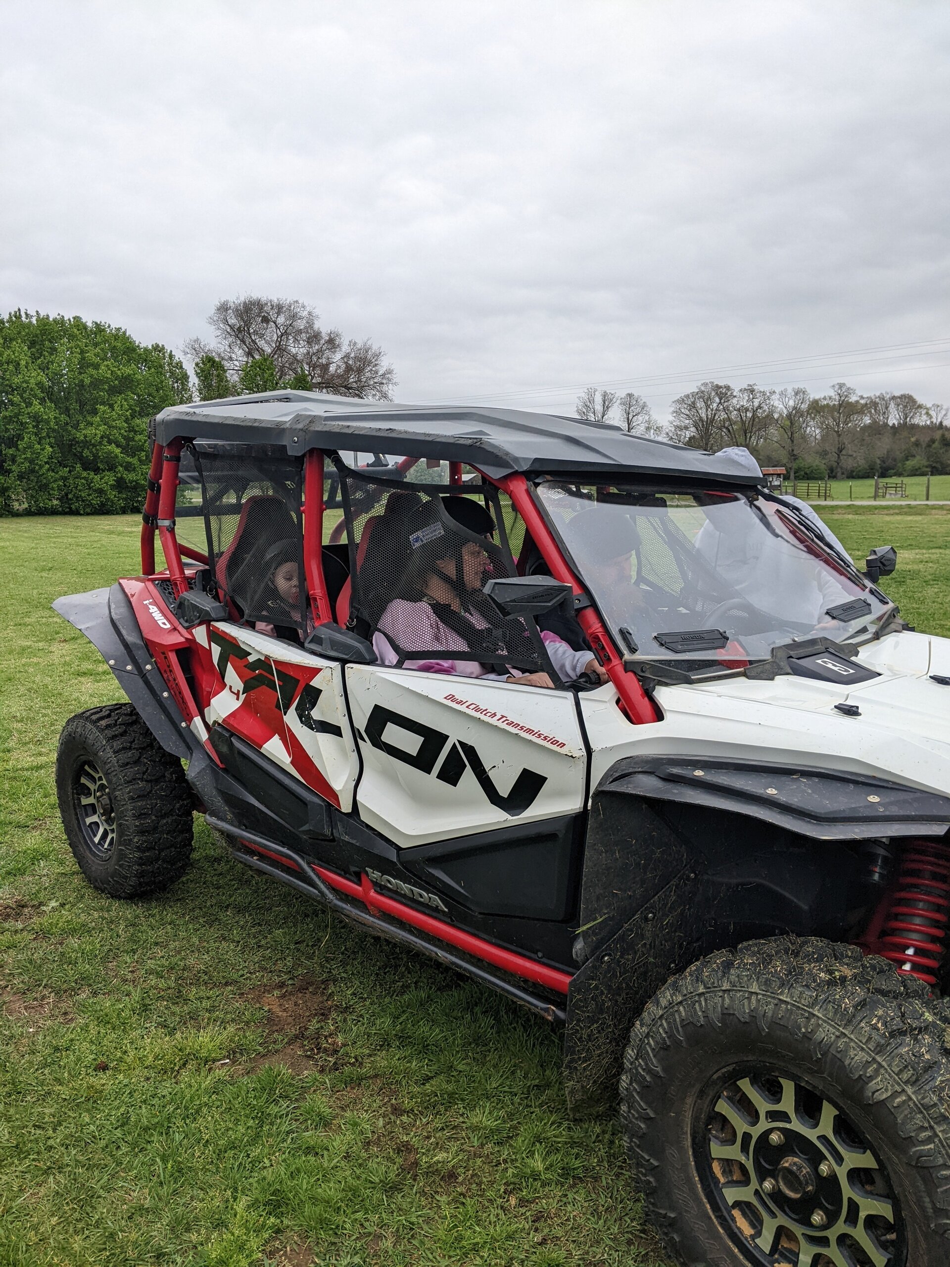 Uwharrieatvrentals Honda Talon  Seater Honda Talon  Seater Parked Green Field